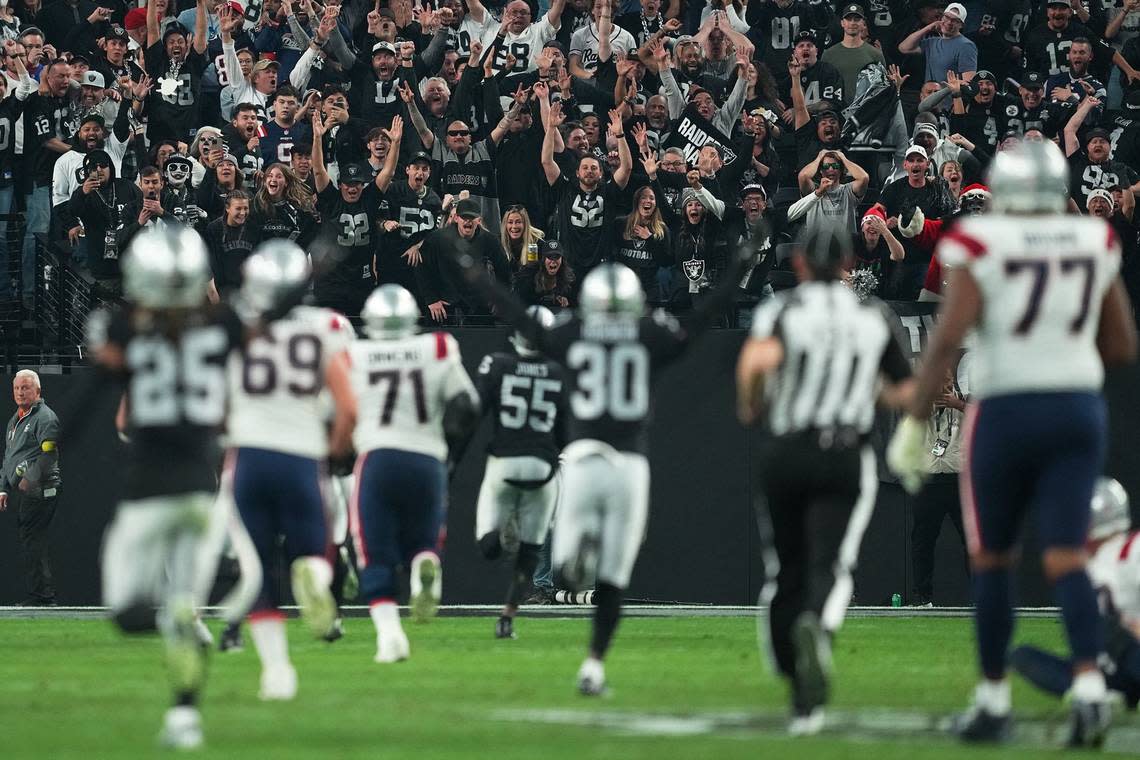 Fans cheer as Chandler Jones of the Las Vegas Raiders scores a touchdown to defeat the New England Patriots at Allegiant Stadium on Sunday, Dec. 18, 2022, in Las Vegas, Nevada.