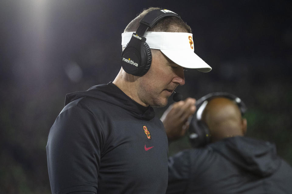 Southern California head coach Lincoln Riley walks back to the bench during the first half an NCAA college football game against Notre Dame Saturday, Oct. 14, 2023, in South Bend, Ind. (AP Photo/Michael Caterina)