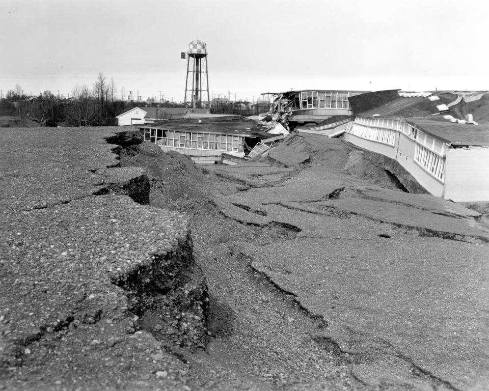In this March 1964 photo released by the U.S. Geological Survey, the Government Hill Elementary School is shown destroyed following an earthquake in Anchorage, Alaska. North America's largest earthquake rattled Alaska 50 years ago, killing 15 people and creating a tsunami that killed 124 more from Alaska to California. The magnitude 9.2 quake hit at 5:30 p.m. on Good Friday, turning soil beneath parts of Anchorage into jelly and collapsing buildings that were not engineered to withstand the force of colliding continental plates. (AP Photo/U.S. Geological Survey)