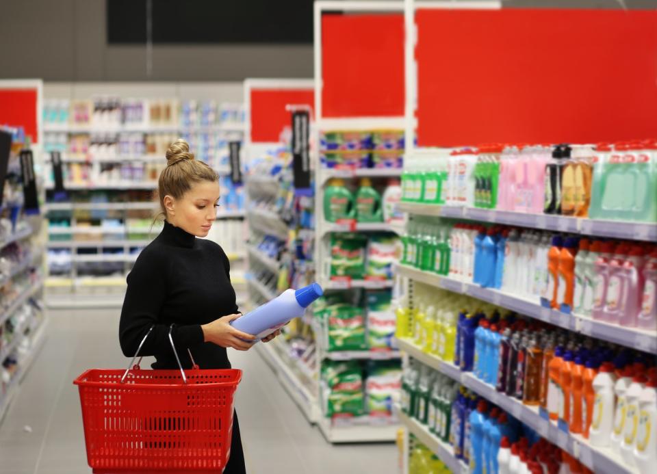 A woman shops in a drugstore.