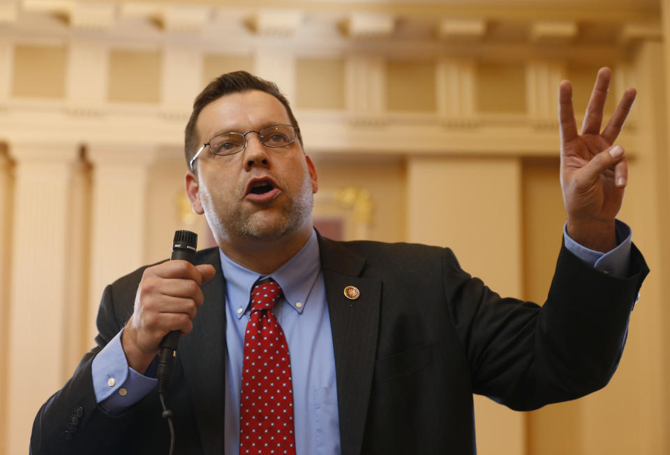 FILE - Then-state Sen. Thomas Garrett, R-Buckingham, speaks during a debate on a bill during the Senate session at the Capitol in Richmond, Va., Jan. 20, 2015. (AP Photo/Steve Helber, File)