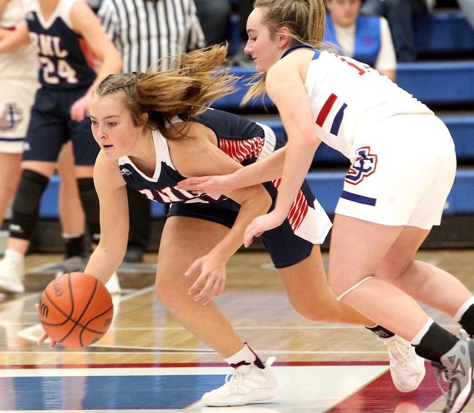 BNL sophomore Madisyn Bailey steals the ball from Jennings County's Kali Thompson in the key 50-34 win at North Vernon.