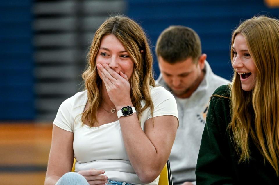 Pewamo-Westphalia's Taylor Smith, left, and teammate Saige Martin, right, react after realizing Smith was named Miss Volleyball during a ceremony on Monday, Nov. 13, 2023, at Pewamo-Westphalia High School. The award is presented by the Detroit Free Press and the Michigan Interscholastic Volleyball Coaches Association.