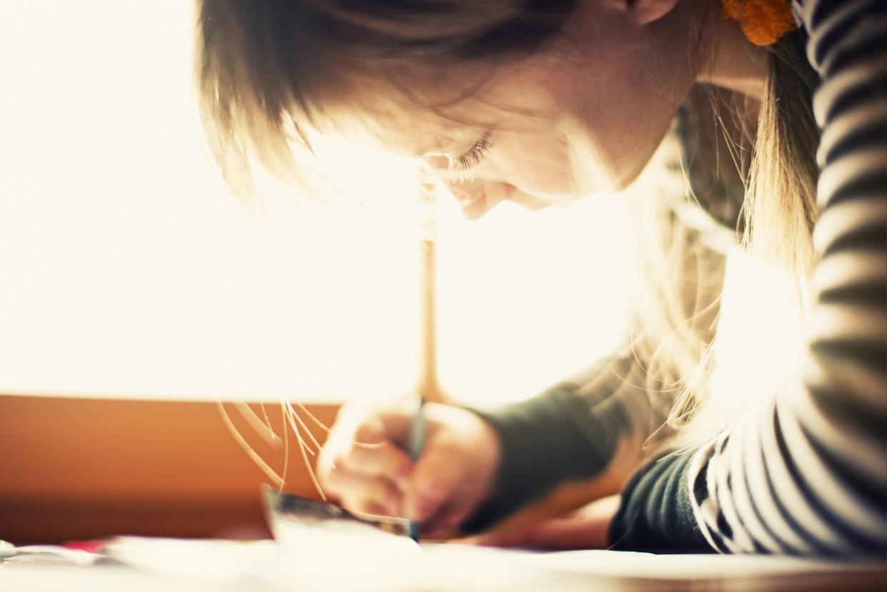 A 10-year-old girl who wrote a poem about dyslexia is winning fans online. (Photo: Getty Images)