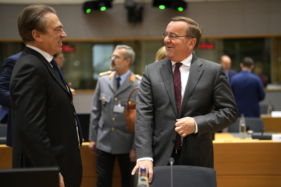 Germany's Defense Minister Boris Pistorius, right, attends a meeting of EU foreign and defense ministers at the European Council building in Brussels, Tuesday, Nov. 14, 2023. European Union foreign and defense ministers gather Tuesday to discuss the situation in Ukraine. (AP Photo/Virginia Mayo)