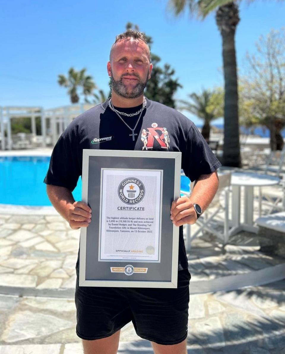 Mr Hodges was part of a team which set a Guinness world record for the highest altitude burger delivered on land after taking one to Mount Kilimanjaro in 2022 (Samaritans/PA)