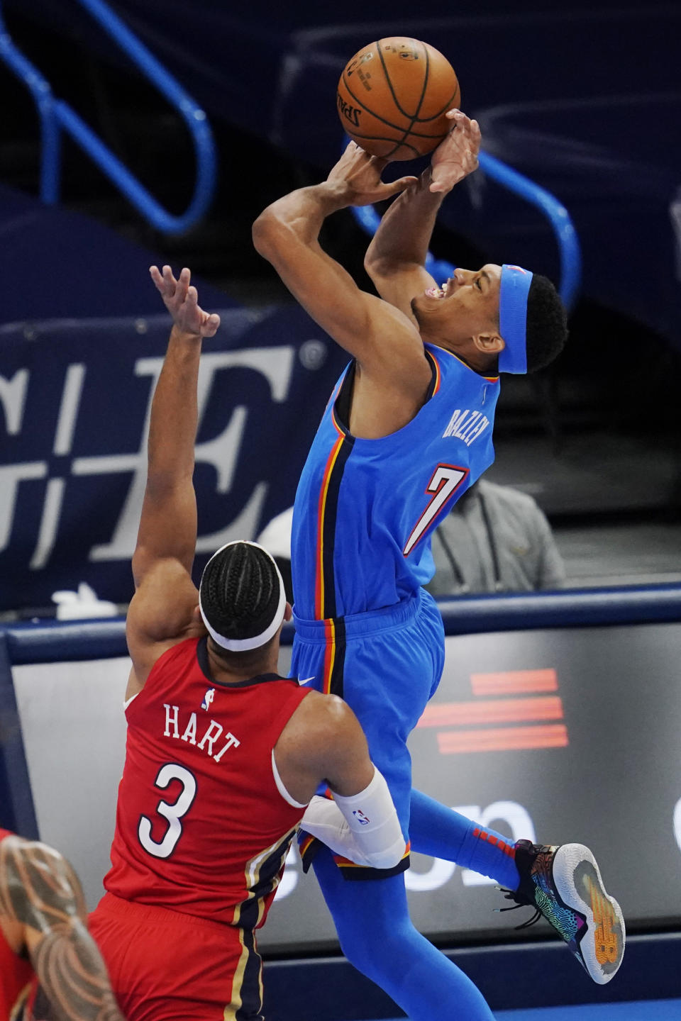 Oklahoma City Thunder forward Darius Bazley (7) is fouled by New Orleans Pelicans guard Josh Hart (3) as he shoots during the second half of an NBA basketball game Thursday, Dec. 31, 2020, in Oklahoma City. (AP Photo/Sue Ogrocki)