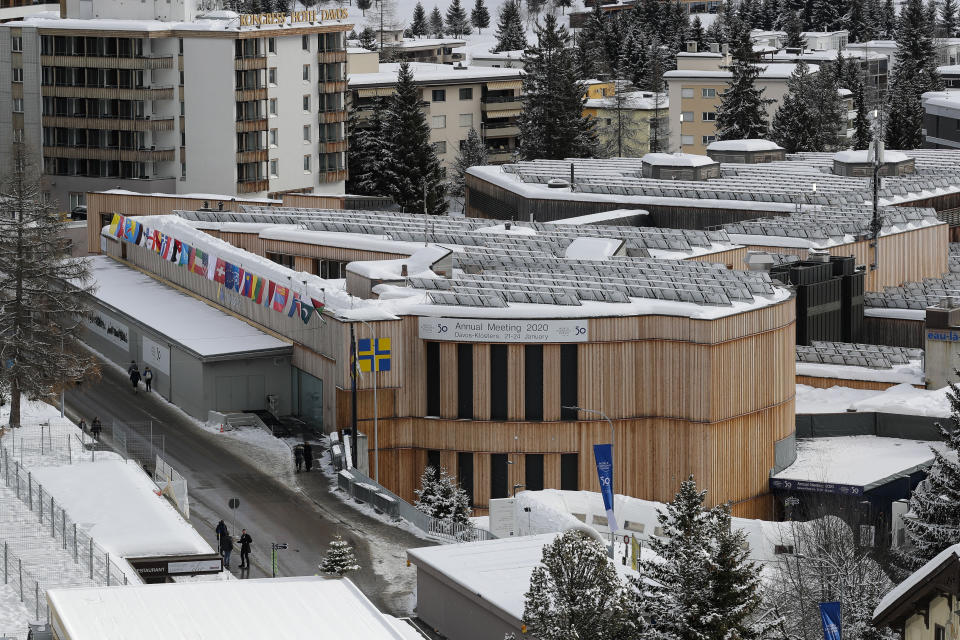 The Davos Congress Centre is prepared for the World Economic Forum in Davos, Switzerland, Sunday, Jan. 19, 2020. The 50th annual meeting of the forum will take place in Davos from Jan. 20 until Jan. 24, 2020. (AP Photo/Markus Schreiber)