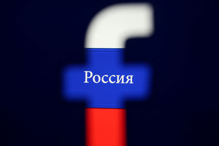 FILE PHOTO: A 3D printed Facebook logo is seen in front of a displayed Russian flag in this photo illustration taken on August 3, 2018. REUTERS/Dado Ruvic/Illustration/File Photo