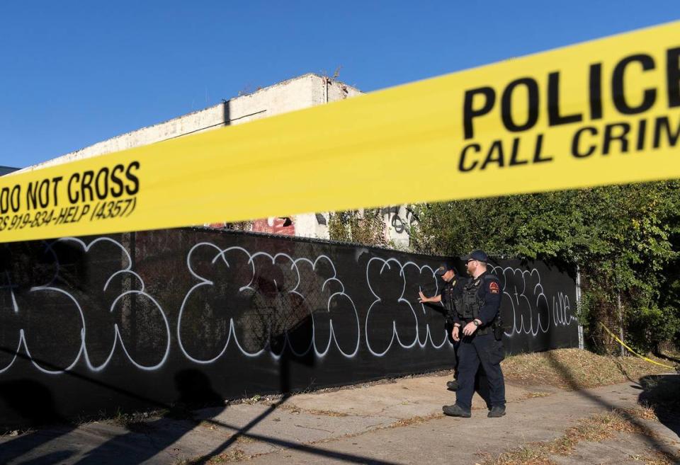 Law enforcement work near the scene of a shooting on Martin Street in Raleigh, N.C. on Monday, Oct. 23, 2023.