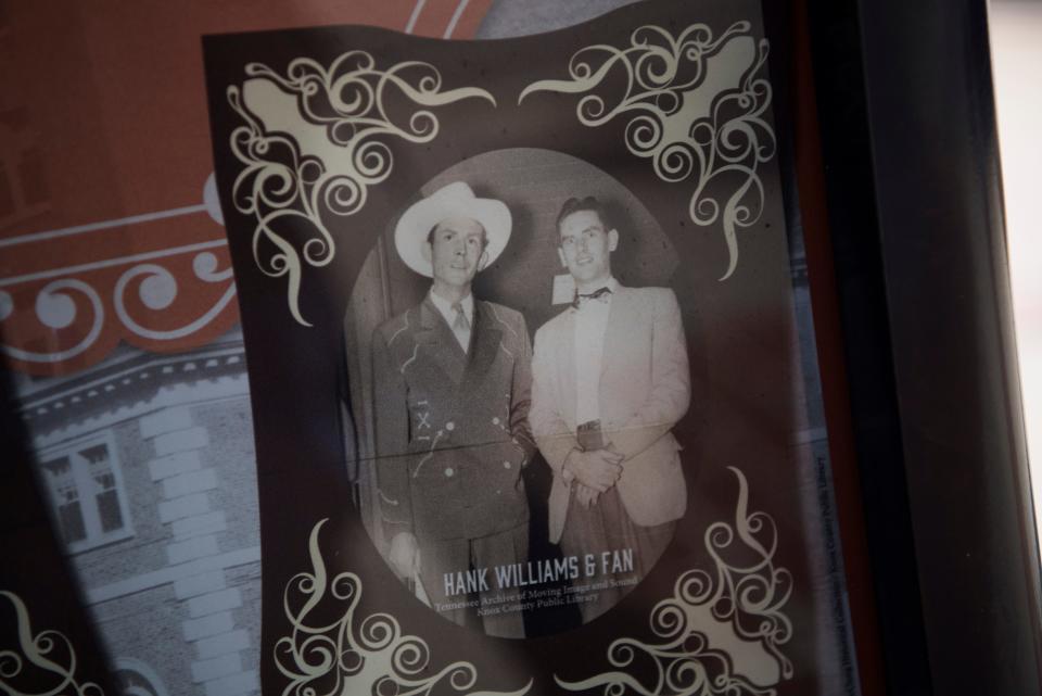 A photo of Hank Williams Sr. is seen outside the Andrew Johnson building in downtown Knoxville on Sept. 25, 2019. Country singer Hank Williams checked into and out of the hotel on New Year's Eve 1952, his last night alive.