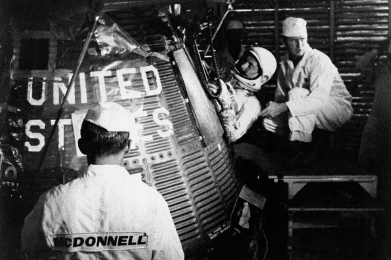 Astronaut Scott Carpenter climbs into Aurora 7 ahead of launching the second American-manned orbital flight on May 24, 1962. File Photo by NASA/UPI