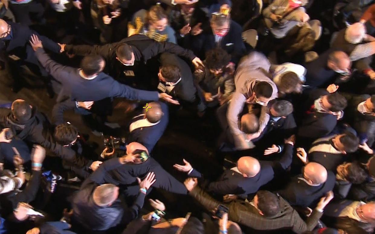 Eric Zemmour is put in headlock as violence erupts at his first political rally - AFP