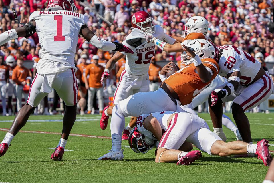 Texas running back Savion Red is tackled during Saturday's loss to Oklahoma. It was the first loss of the season for the Longhorns who dropped to 2-1 in Big 12 play as well.