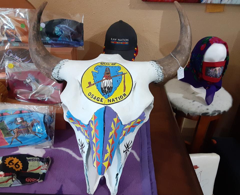 A skull painted with a seal of the Osage Nation is displayed in 2021 inside the Osage-owned Water Bird Gallery in downtown Pawhuska. Owner Danette Daniels is moving the gallery to her nearby hometown of Fairfax in the hopes of reviving the small town in the wake of the theatrical release of "Killers of the Flower Moon."