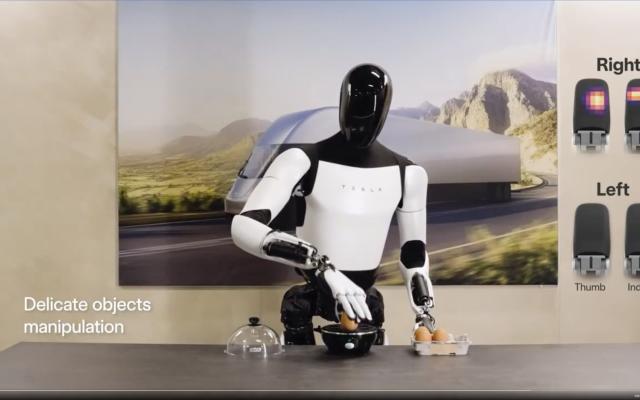Tesla unveils humanoid robot that can pick up an egg without breaking it
