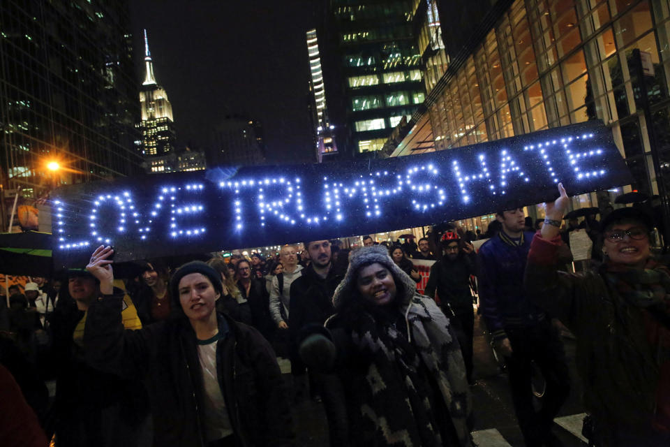 The Empire State Building is seen in background during march against President-elect Donald Trump in Manhattan, New York