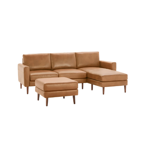 brown leather 3-piece sectional sofa with ottoman against white background