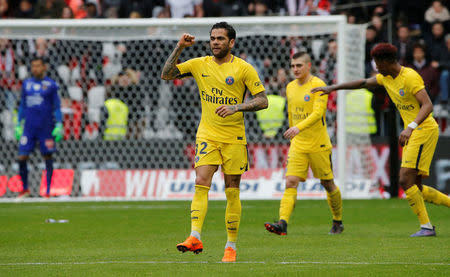 Soccer Football - Ligue 1 - OGC Nice vs Paris St Germain - Allianz Riviera, Nice, France - March 18, 2018 Paris Saint-Germain’s Dani Alves celebrates scoring their second goal REUTERS/Jean-Paul Pelissier