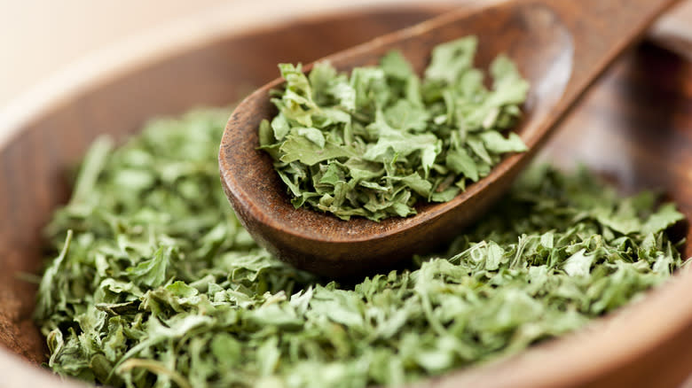 dried parsley flakes in bowl