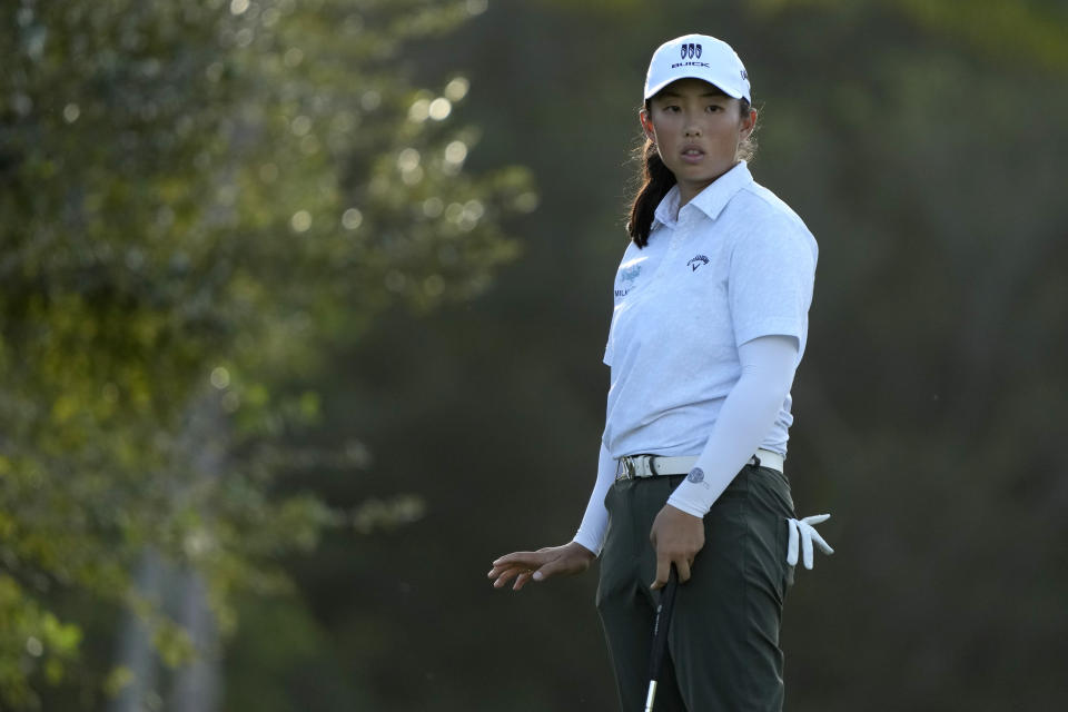 Ruoning Yin, of China, watches her shot on the 17th green during the first round of the LPGA CME Group Tour Championship golf tournament, Thursday, Nov. 16, 2023, in Naples, Fla. (AP Photo/Lynne Sladky)