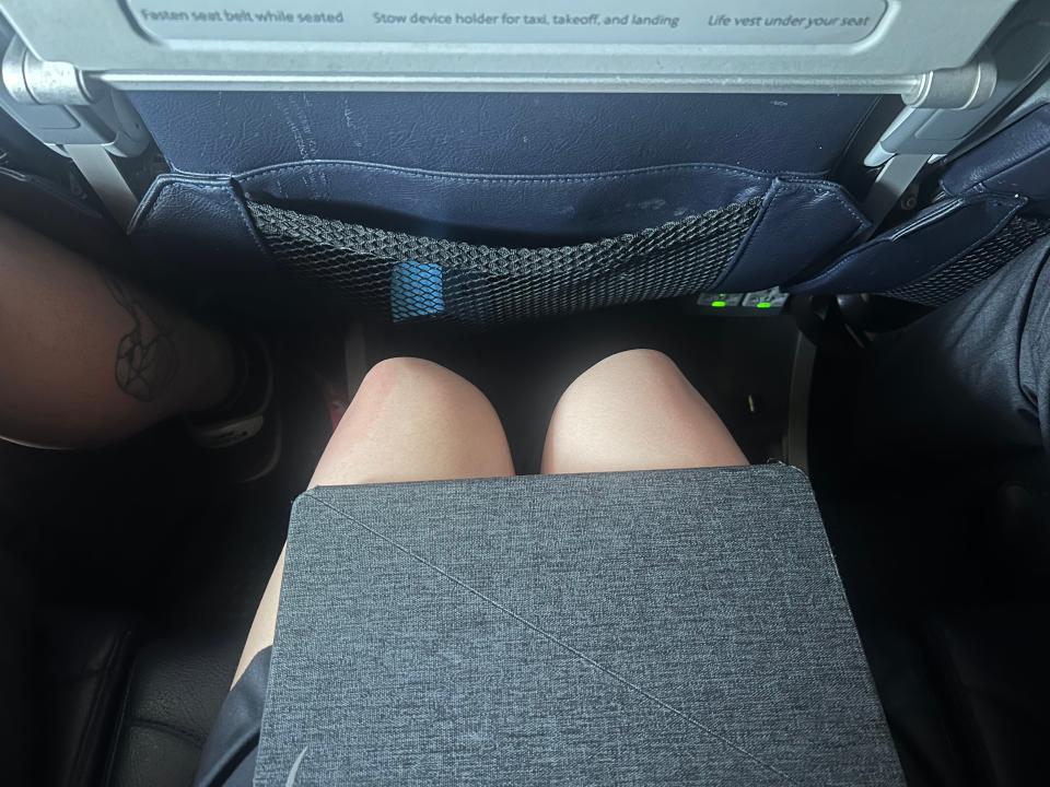 The author's legroom in American's 737-800.