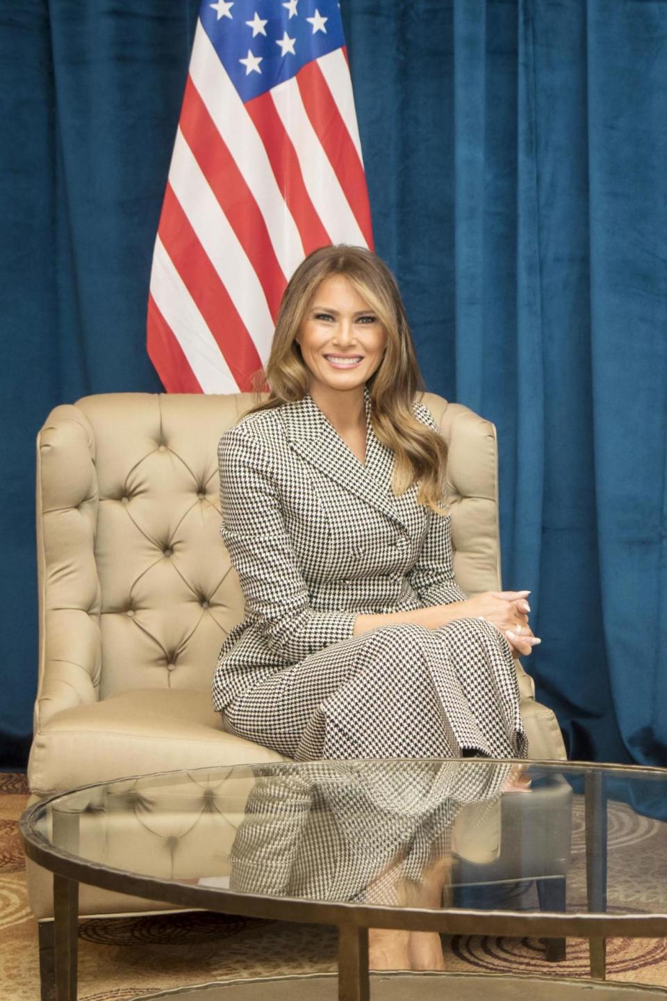 US First Lady Melania Trump smiles for the camera as she meets Prince Harry for the first time (PA)