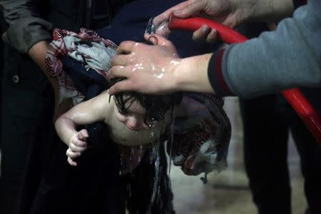 A child is treated in a hospital in Douma, eastern Ghouta in Syria, after what a Syria medical relief group claims was a suspected chemical attack April, 7, 2018. White Helmets/Handout via REUTERS