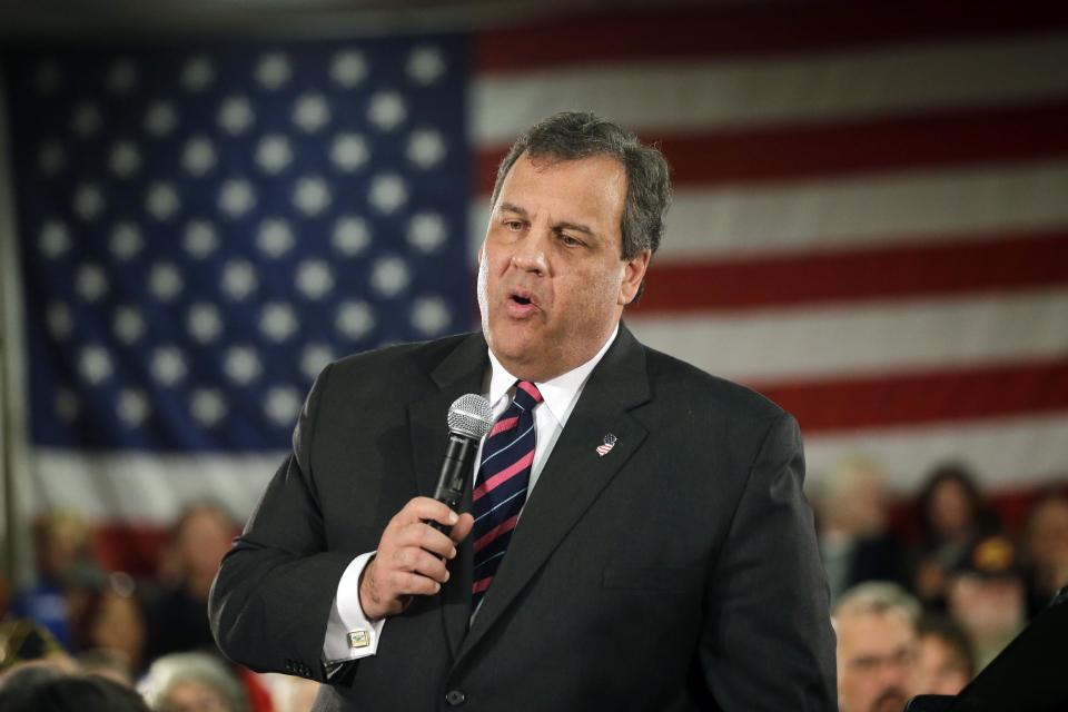 New Jersey Gov. Chris Christie addresses a large gathering Thursday, Feb. 20, 2014, in Middletown, N.J., during a town hall meeting. Christie returned to Republican-controlled Monmouth County on Thursday for his first town hall since private emails revealed a political payback scandal in which his associates ordered traffic lanes closed, causing lengthy backups. But the scandal didn't come up. Instead, the 51-year-old Republican heard from residents who have not returned to their homes since the 2012 storm. (AP Photo/Mel Evans)