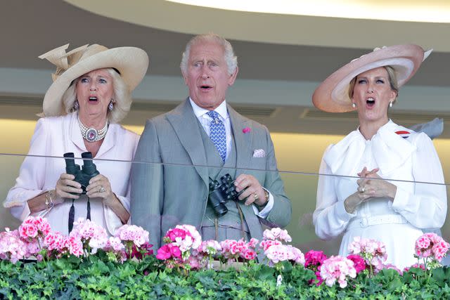 <p>Chris Jackson/Getty</p> Queen Camilla, King Charles and Sophie, the Duchess of Edinburgh react to a race at Royal Ascot