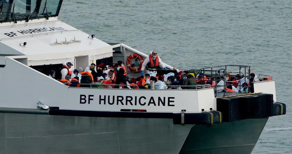 A group of people thought to be migrants are brought in to Ramsgate by Border Force officers. (Gareth Fuller/PA) (PA Wire)