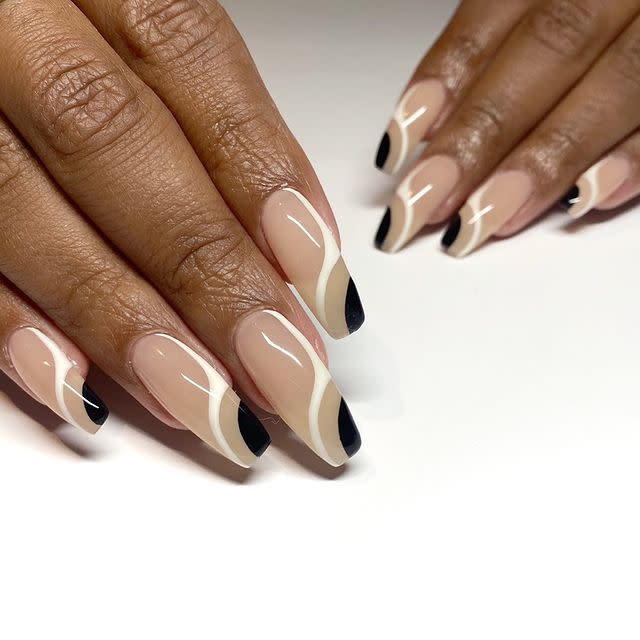 <p>Combining opposite shades, like black and white, can <strong>create some really cool, balanced looks, even when the design is asymmetrical</strong>. Take the abstract shapes on these <a href="https://www.cosmopolitan.com/style-beauty/beauty/g26451517/ballerina-nails-shape-design/" rel="nofollow noopener" target="_blank" data-ylk="slk:ballerina nails;elm:context_link;itc:0;sec:content-canvas" class="link ">ballerina nails</a>, for instance.<br></p><p><a href="https://www.instagram.com/p/CIWHcA8h9OM/?utm_source=ig_embed&utm_campaign=loading" rel="nofollow noopener" target="_blank" data-ylk="slk:See the original post on Instagram;elm:context_link;itc:0;sec:content-canvas" class="link ">See the original post on Instagram</a></p>