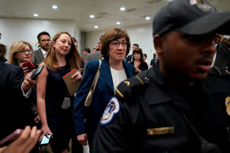 Sen. Susan Collins (R-ME) speaks with reporters on the way to the Senate floor on Capitol Hill in Washington, U.S., October 3, 2018. REUTERS/Aaron P. Bernstein