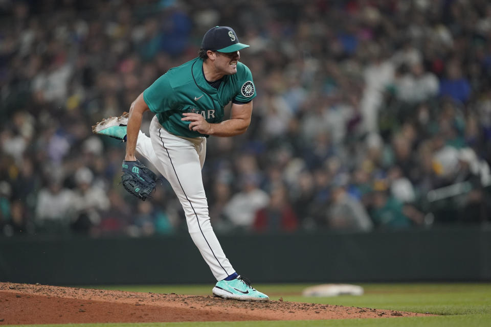 Seattle Mariners starting pitcher Robbie Ray follows through after giving up a single to Los Angeles Angels' Max Stassi that broke up his no-hitter during the seventh inning of a baseball game, Friday, June 17, 2022, in Seattle. (AP Photo/Ted S. Warren)