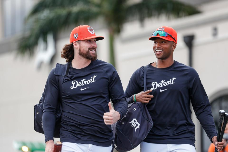 Detroit Tigers infielder Ryan Vilade talks to outfielder Justyn-Henry Malloy as they walk towards practice field during spring training at TigerTown in Lakeland, Fla. on Monday, Feb. 19, 2024.