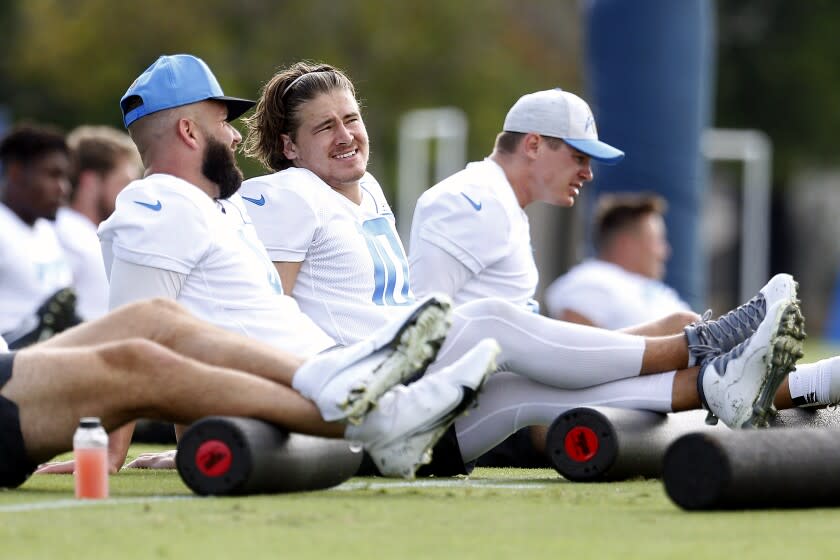 COSTA MESA, CA - JULY 28: Chargers quarterback Justin Herbert (10), center, at LA Chargers training camp.