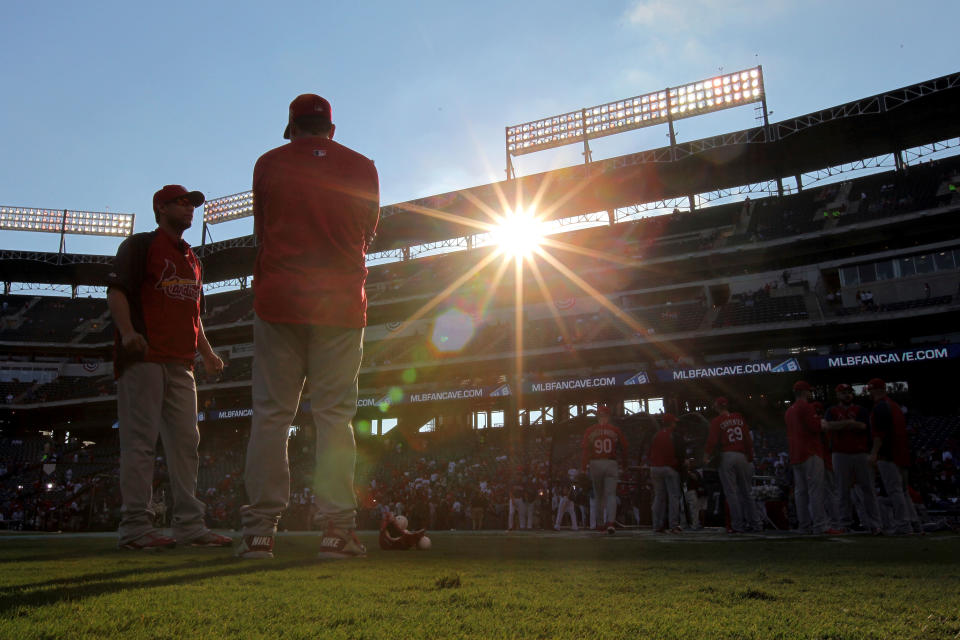 ARLINGTON, TX - OCTOBER 23: The St. Louis Cardinals warm up before Game Four of the MLB World Series against the Texas Rangers at Rangers Ballpark in Arlington on October 23, 2011 in Arlington, Texas. (Photo by Doug Pensinger/Getty Images)