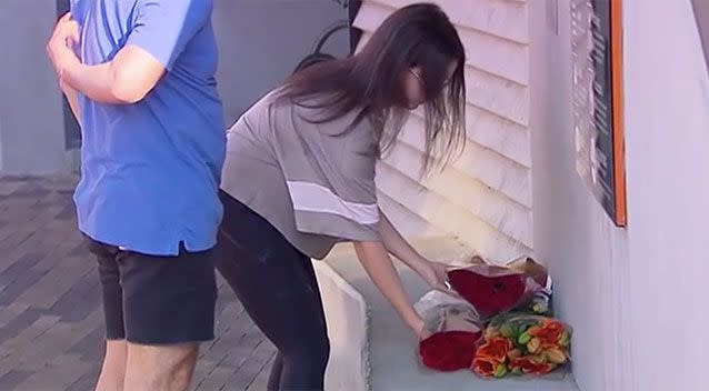 Residents lay flowers and notes for Alex. Source: 7 News