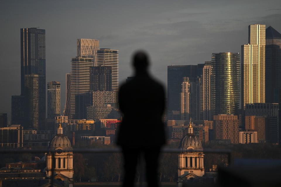 The morning sunlight illuminates the office buildings of the Canary Wharf financial district in London on November 9, 2020. - Britain and the European Union resumed crucial negotiations in London on Monday over a post-Brexit free trade deal, with time running short and both sides saying major obstacles remain. (Photo by DANIEL LEAL-OLIVAS / AFP) (Photo by DANIEL LEAL-OLIVAS/AFP via Getty Images)