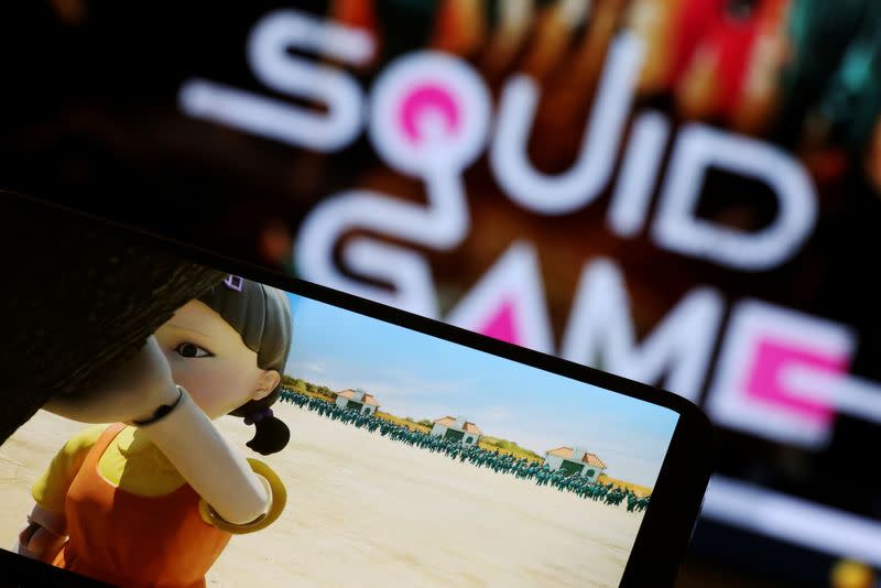 FILE PHOTO: The Netflix series "Squid Game" is played on a mobile phone in this picture illustration