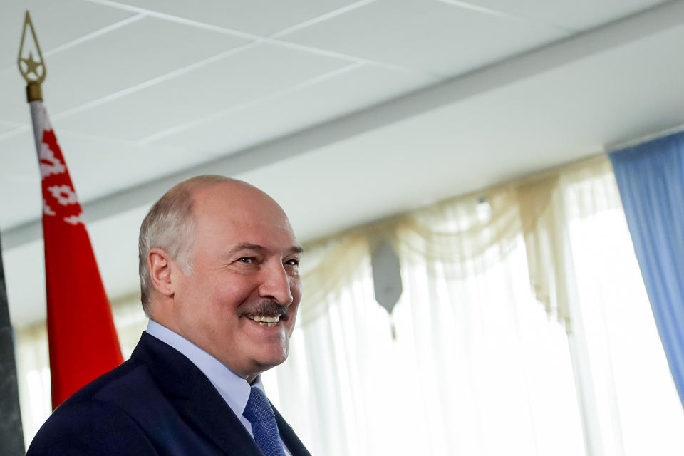 FILE - In this Sunday, Aug. 9, 2020 file photo, Belarusian President Alexander Lukashenko smiles after voting at a polling station during the presidential election in Minsk, Belarus. Lukashenko earned the nickname of “Europe’s last dictator” in the West for his relentless repression of dissent since taking the helm in 1994. was once called “Europe’s last dictator” in the West and has ruled Belarus with an iron fist for 27 years. But when massive protests that began last August presented him with an unprecedented challenge, he responded with exceptional force. (AP Photo, File)