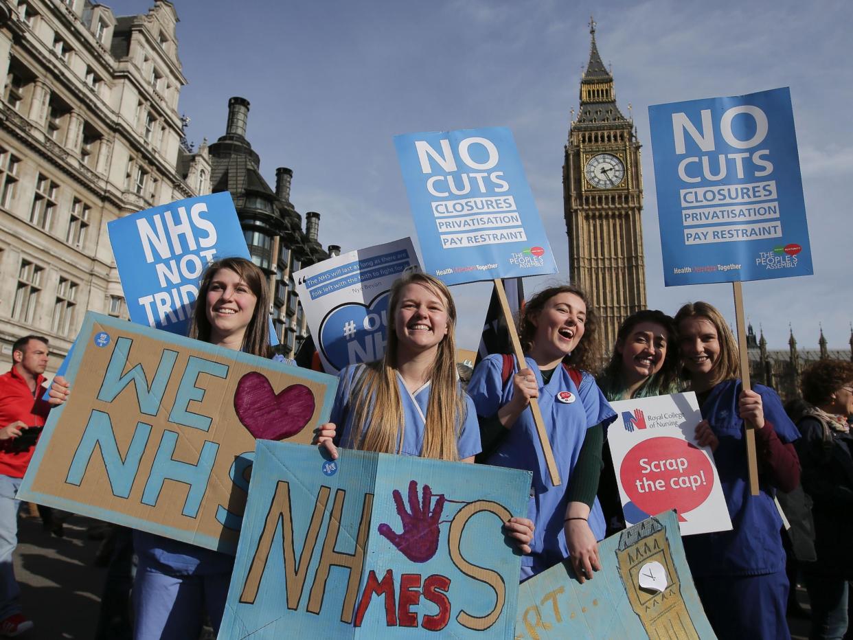 Protesters at a demonstration against cuts to NHS funding in central London: Getty Images