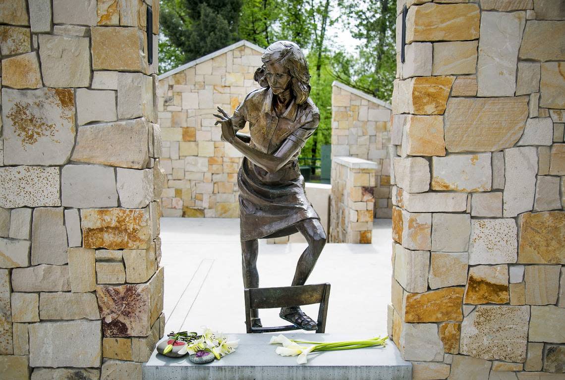 Fresh flowers lay at the feet of the Anne Frank statue in Boise after signs at the Anne Frank Human Rights Memorial were vandalized in May 2017.