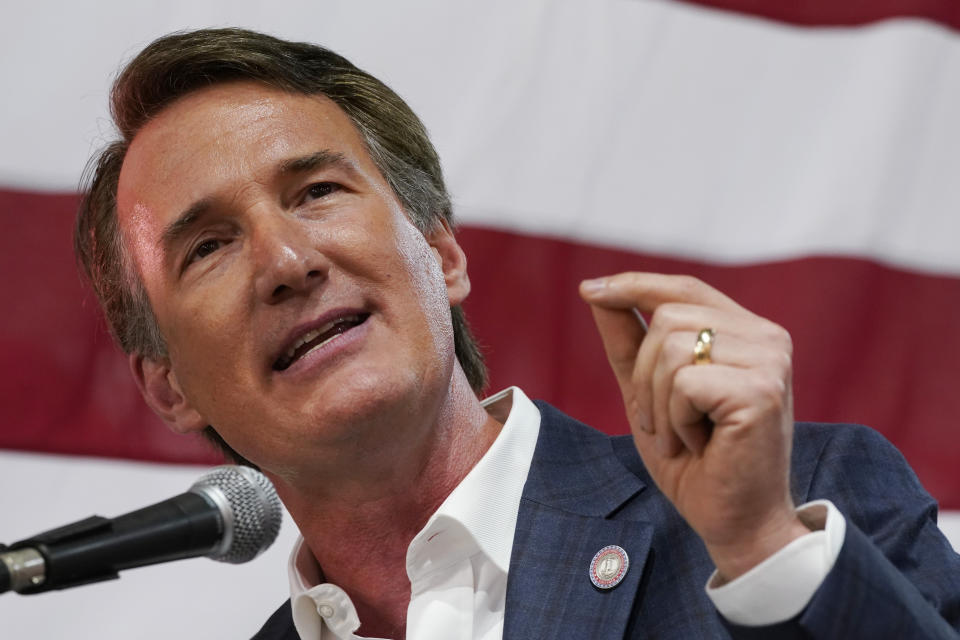 Virginia Gov. Glenn Youngkin speaks prior to signing the budget at a ceremony at a grocery store Tuesday June 21, 2022, in Richmond, Va. The Virginia General Assembly passed the budget earlier in the week. (AP Photo/Steve Helber)