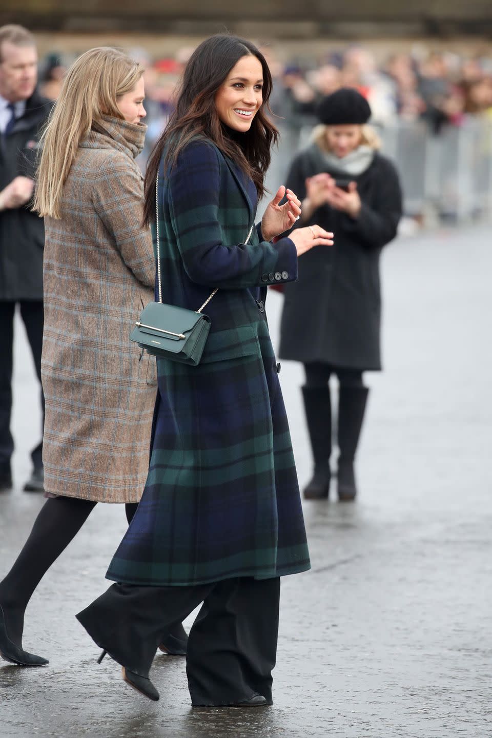 <p>Meghan went all out with the tartan for trip to Scotland with this tartan Burberry coat and matching green Strathberry bag (just don't mention the fact that she was wearing the same outfit as a <a href="https://www.cosmopolitan.com/uk/fashion/celebrity/a17298021/meghan-markle-tartan-burberry-coat/" rel="nofollow noopener" target="_blank" data-ylk="slk:horse;elm:context_link;itc:0;sec:content-canvas" class="link ">horse</a>). </p>