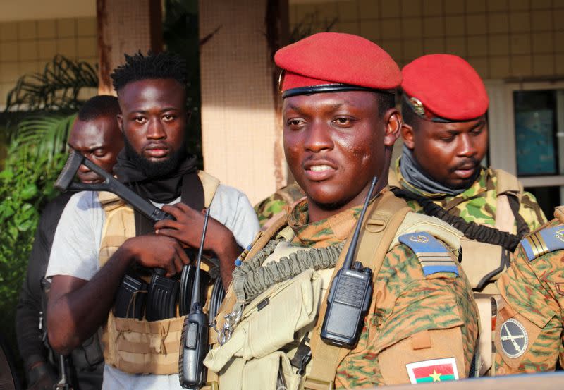 FILE PHOTO: Burkina Faso's new military leader Ibrahim Traore is escorted by soldiers in Ouagadougou