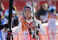 United States' Julia Mancuso sticks out her tongue in the finish area after a women's downhill training run for the Sochi 2014 Winter Olympics, Saturday, Feb. 8, 2014, in Krasnaya Polyana, Russia. (AP Photo/Gero Breloer)