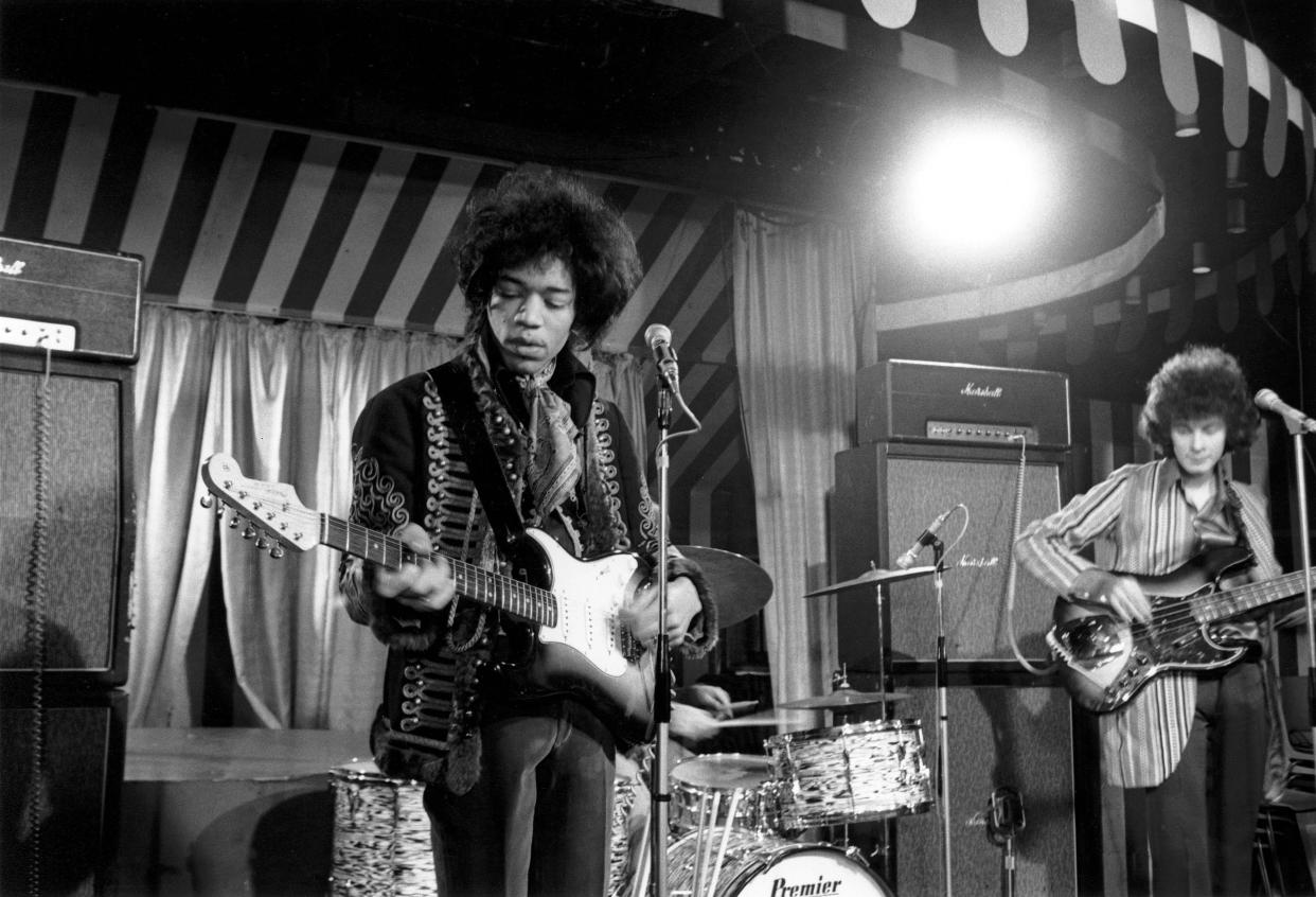 Jimi Hendrix and Noel Redding performing live onstage while filming German TV show 'Beat Club', with Marshall amplifiers behind