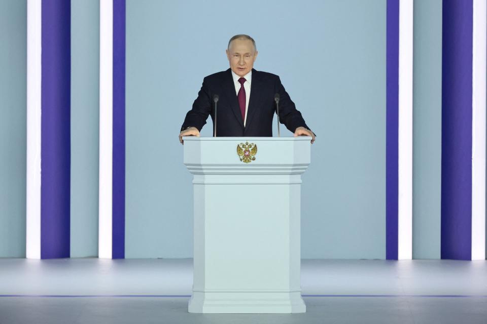 Russian President Vladimir Putin delivers his annual state of the nation address, in Moscow on Feb. 21, 2023.