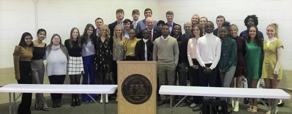 Members of Jefferson County's Chamber of Commerce Youth Leadership pose with their local legislators.